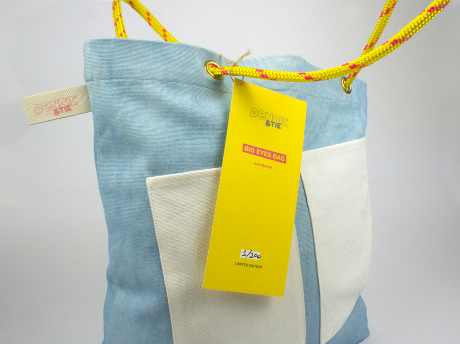 Large full colour hangtag with individual bag number and production imagery